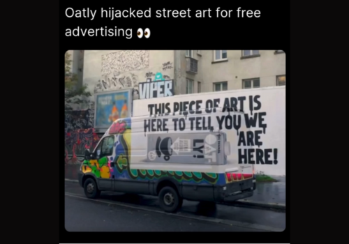 Oatly wall mural in Paris with self-referential text admitting ads are not appreciated