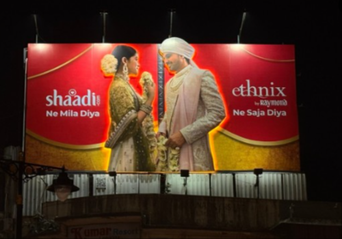 Split billboard with bride and groom panels from Shaadi.com and Ethnix by Raymond completing one sentence